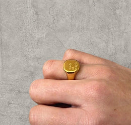 Cool vintage style gold colour stainless steel signet ring with made of magic engraving.