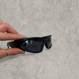 Insane alien sunglasses in black with black lenses. One size