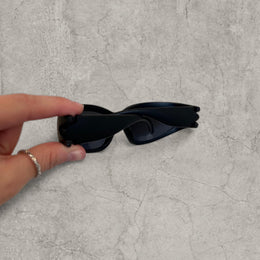 Insane alien sunglasses in black with black lenses. One size