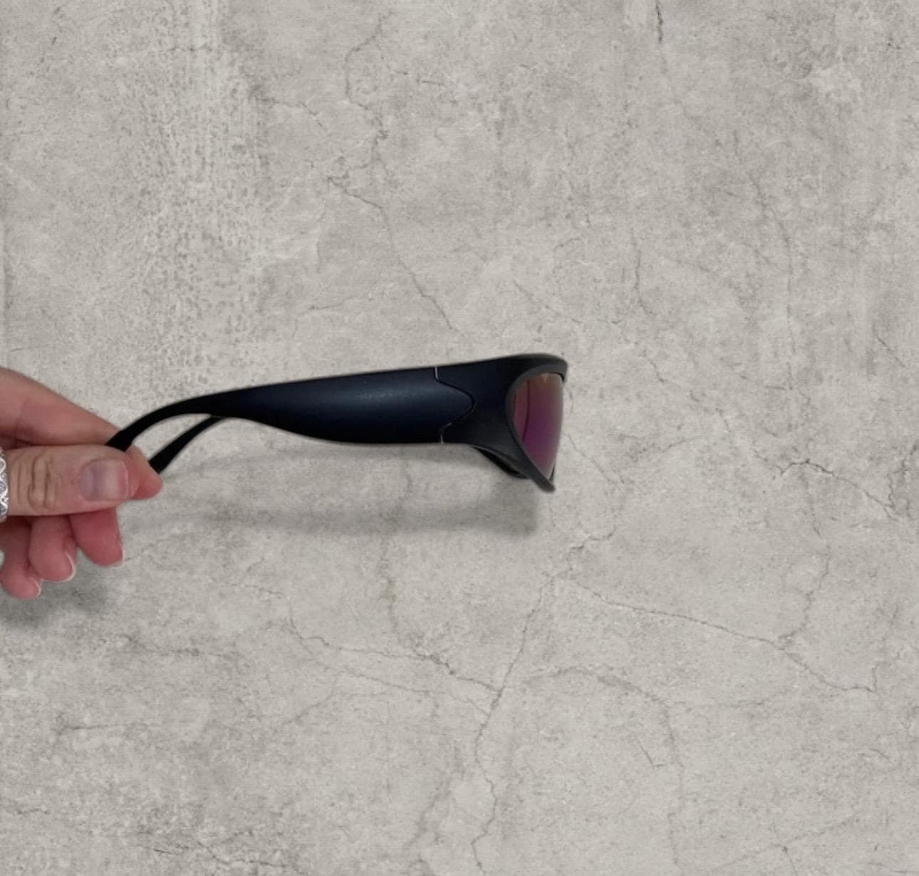 Insane alien sunglasses in black with reflective blue purple lenses. One size
