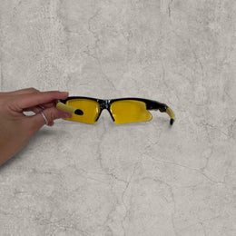 Insane sport sunglasses in black with yellow lenses. One size