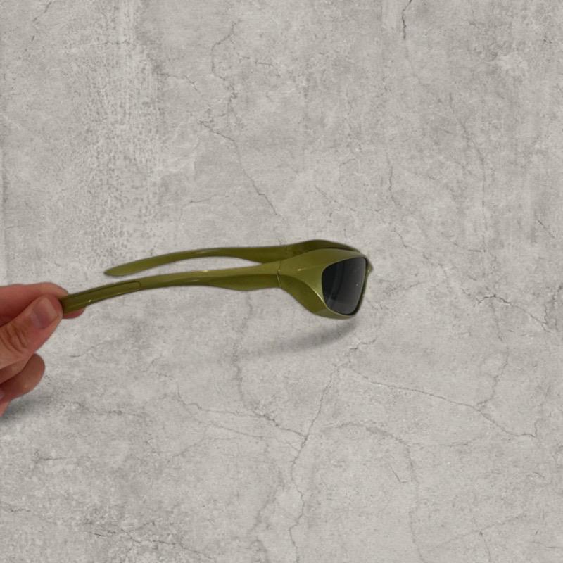 Insane UV400 sunglasses in khaki green with black lense. One size.