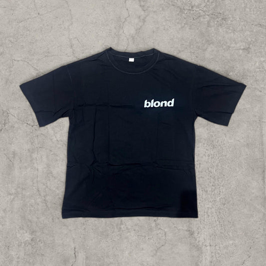 Front view of black Frank Ocean T-shirt with small white blond spellout on left chest