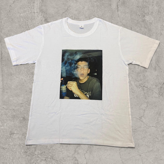 White McLovin T-shirt with large front photo graphic of person smoking