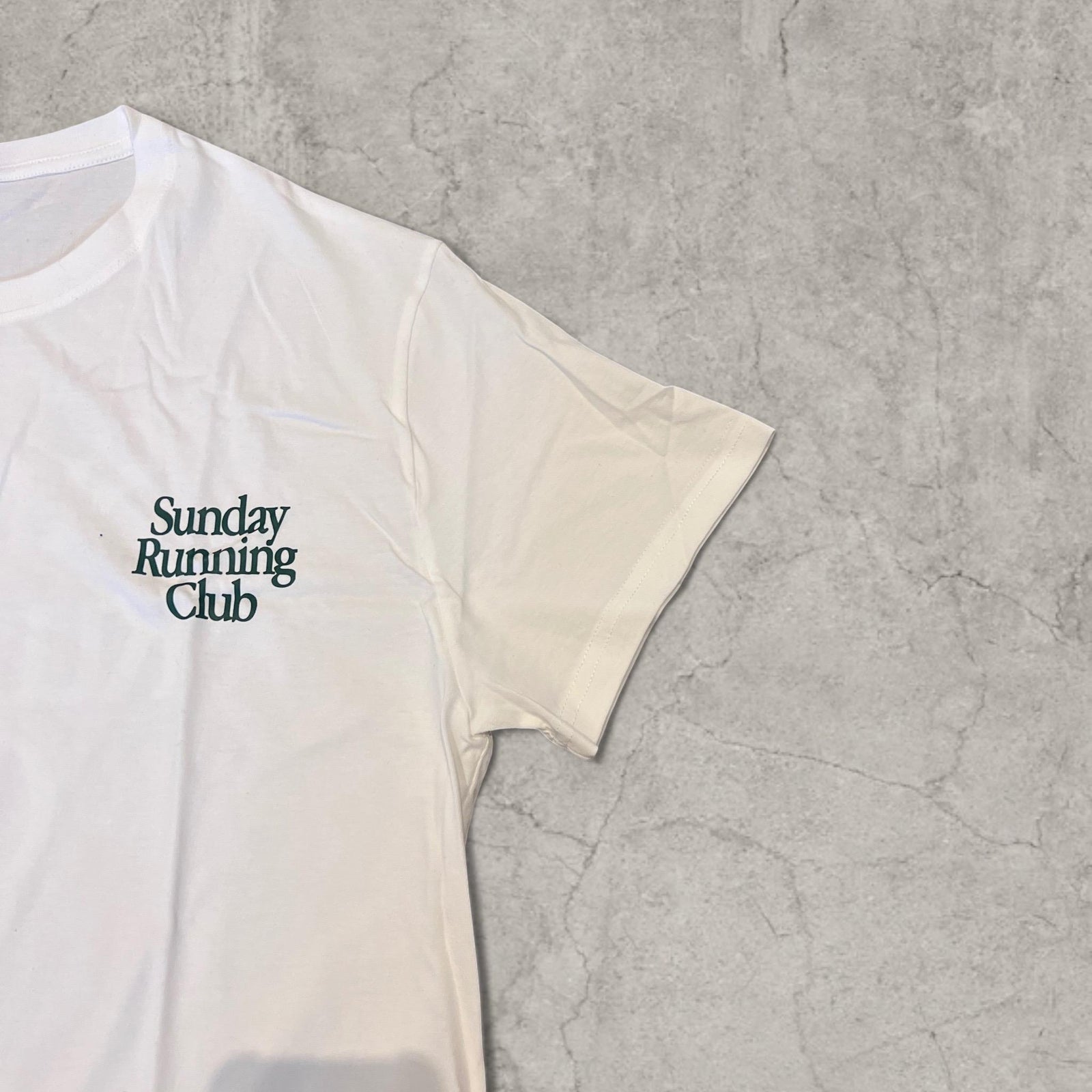 Sunday Running Club vintage style T-shirt with back graphic in white.