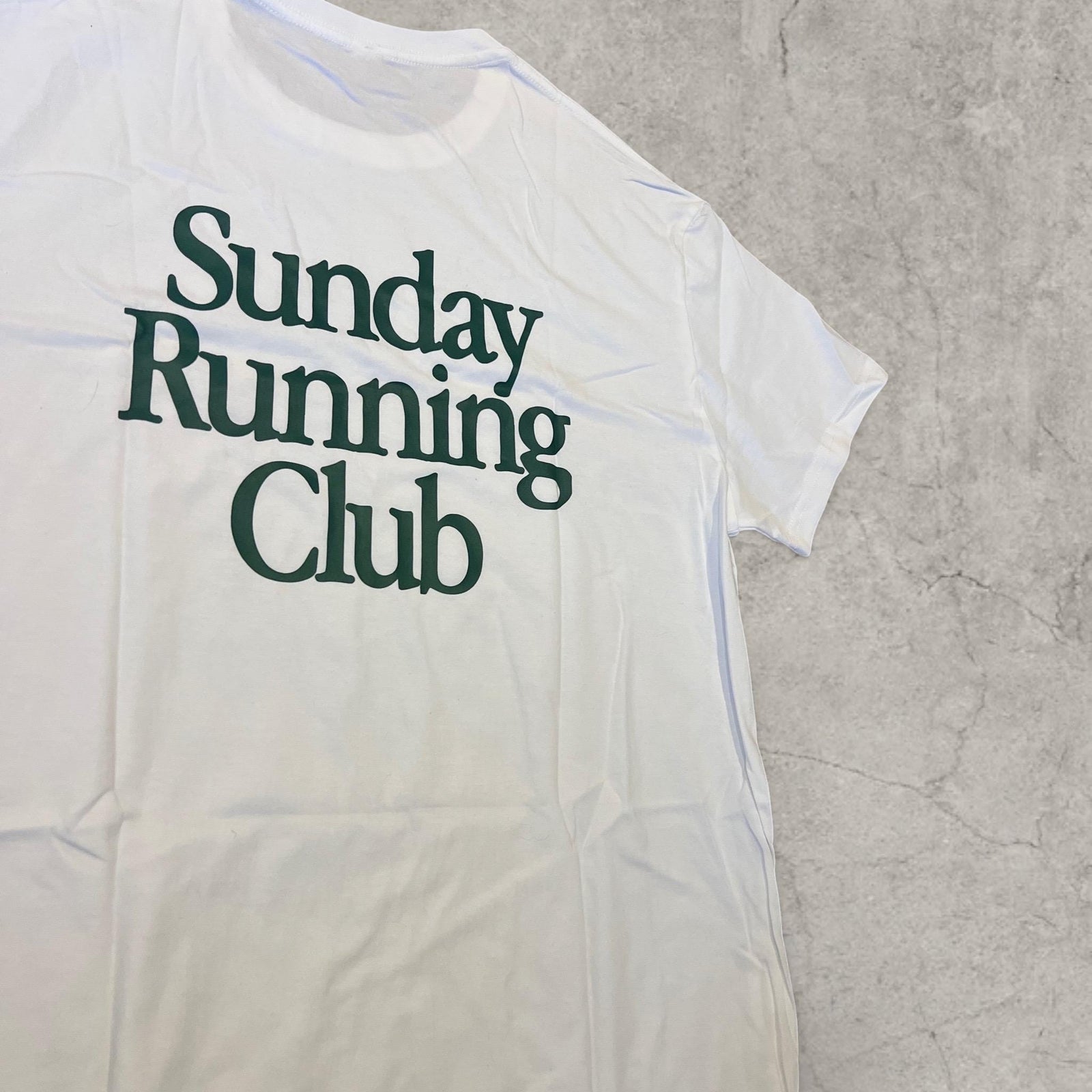Sunday Running Club vintage style T-shirt with back graphic in white.
