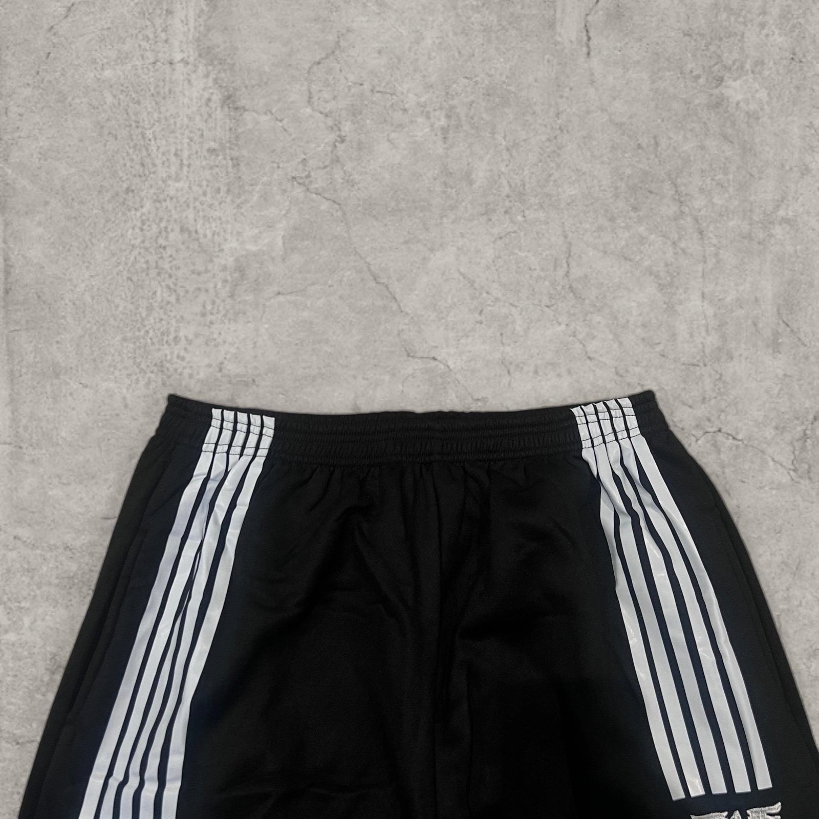 Incredible super baggy wide leg Korean joggers in black with white stripe.