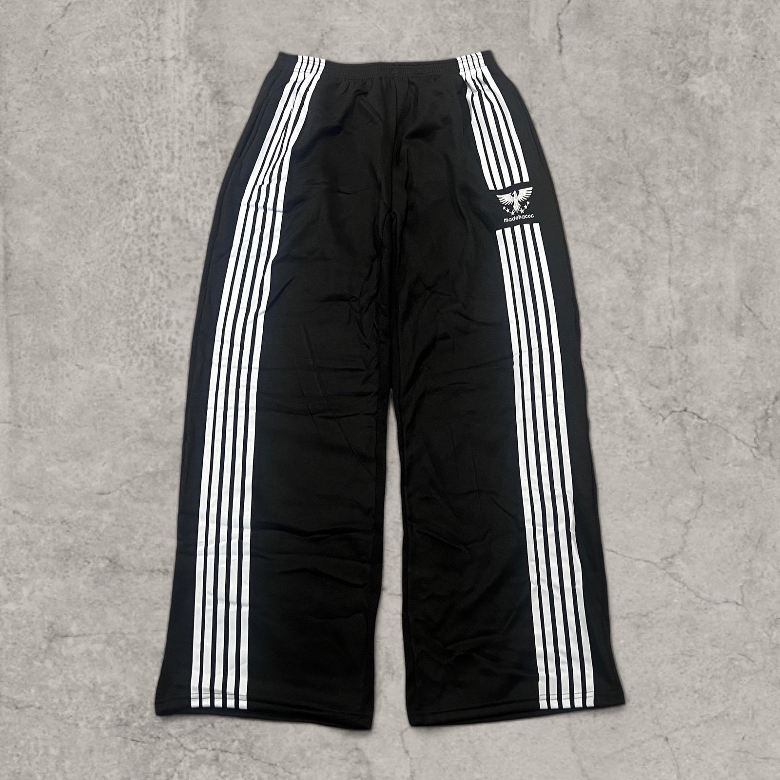 Incredible super baggy wide leg Korean joggers in black with white stripe.