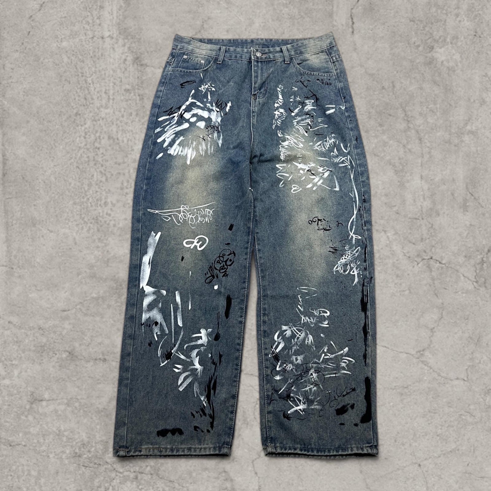 Insane baggy relaxed fit in washed  blue with graffiti white black print.