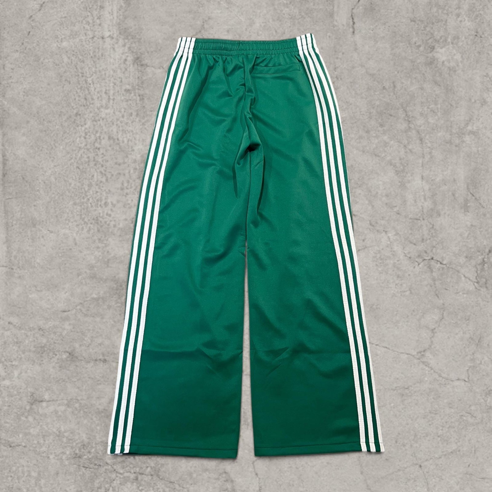 Insane baggy relaxed fit trousers in dark green with white stripes.
