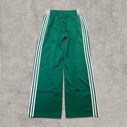 Insane baggy relaxed fit trousers in dark green with white stripes.