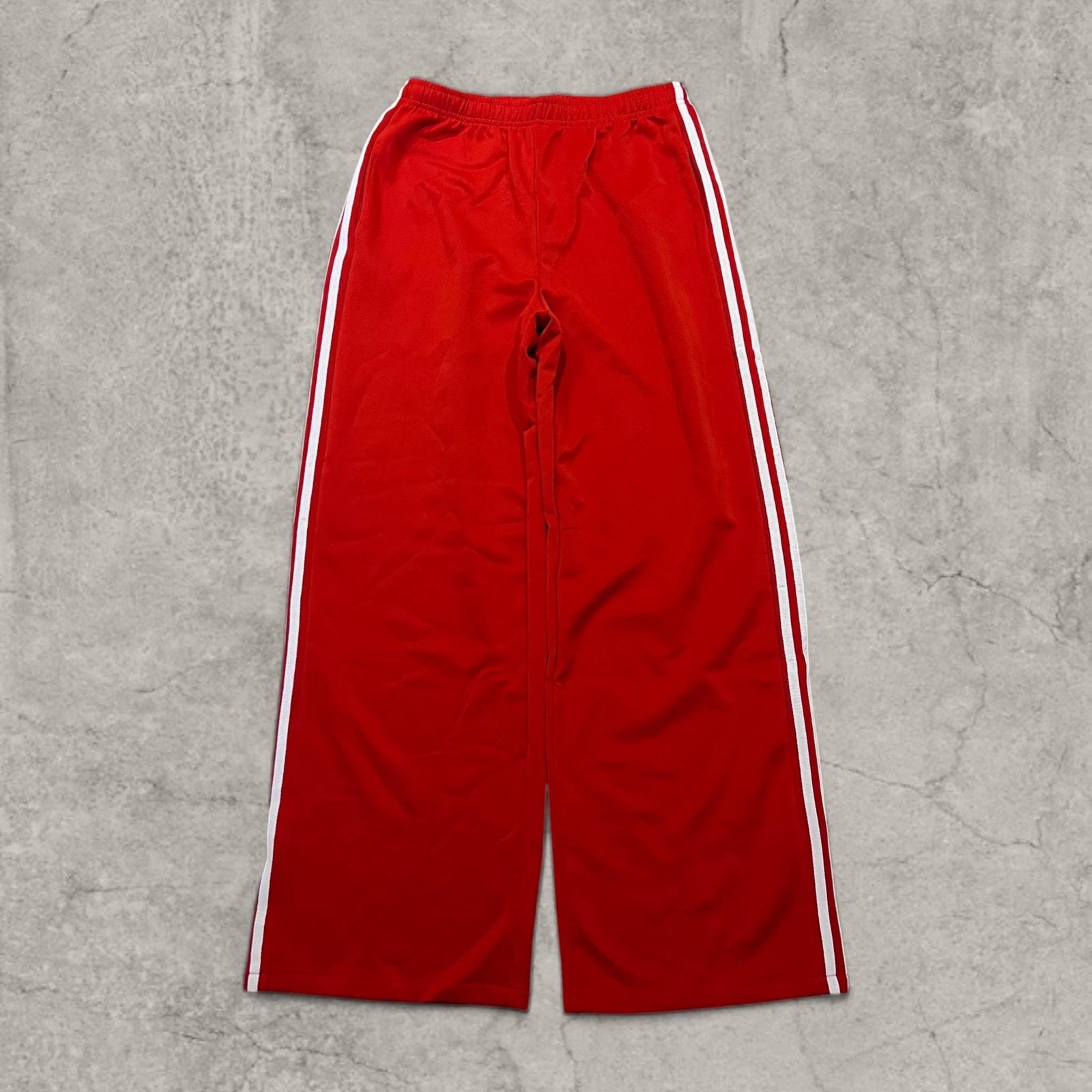 Insane baggy relaxed fit trousers in red with white stripes.
