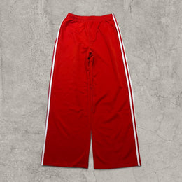 Insane baggy relaxed fit trousers in red with white stripes.