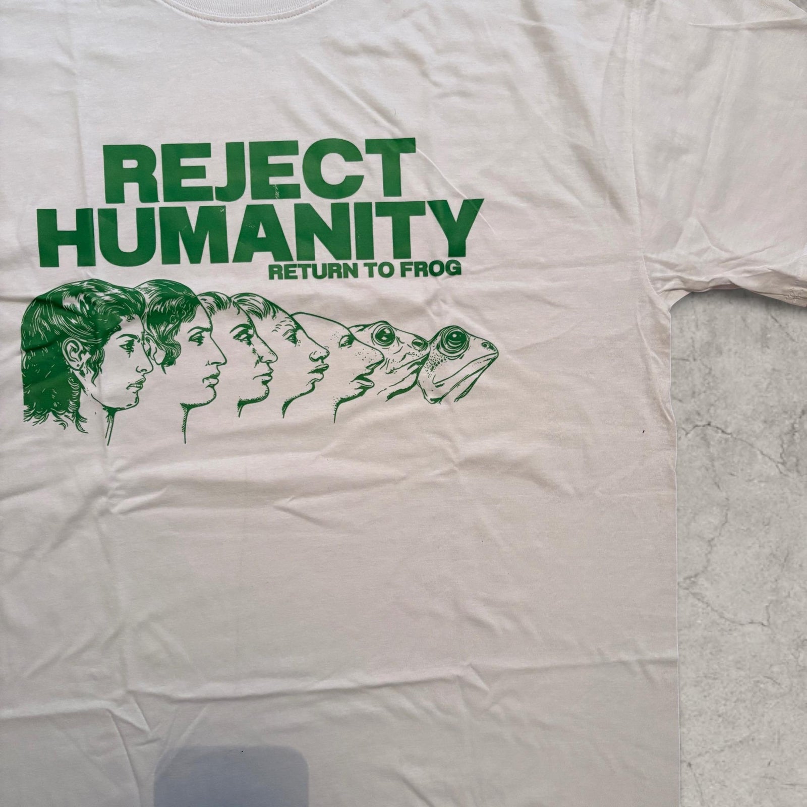 Reject Humanity vintage style T-shirt with front graphic in white.