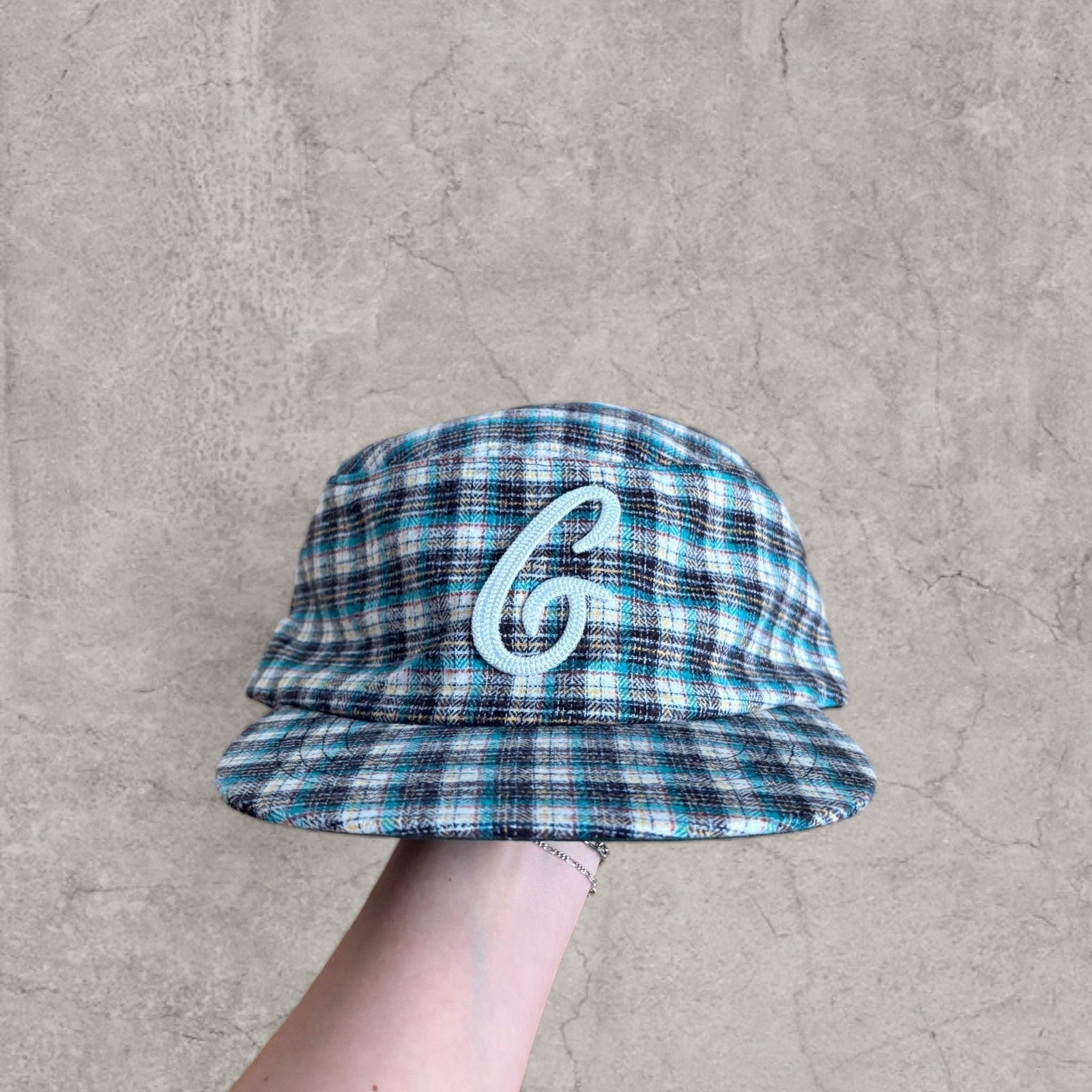 Vintage style baseball cap in plaid checkered blue white with white logo