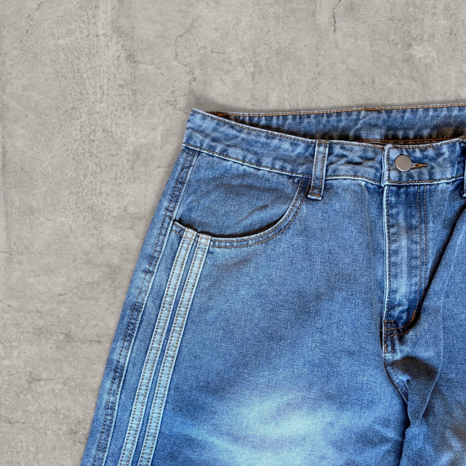 Japanese wide-leg skater jeans with stripe detailing in washed blue