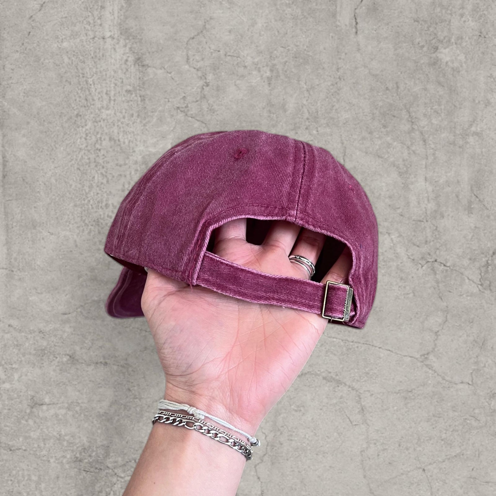 Vintage style baseball cap with yellow camel logo in burgundy