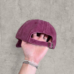 Vintage style baseball cap with yellow camel logo in burgundy