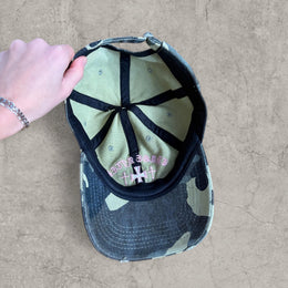 Vintage style baseball cap in khaki green camo print with pink gothic logo