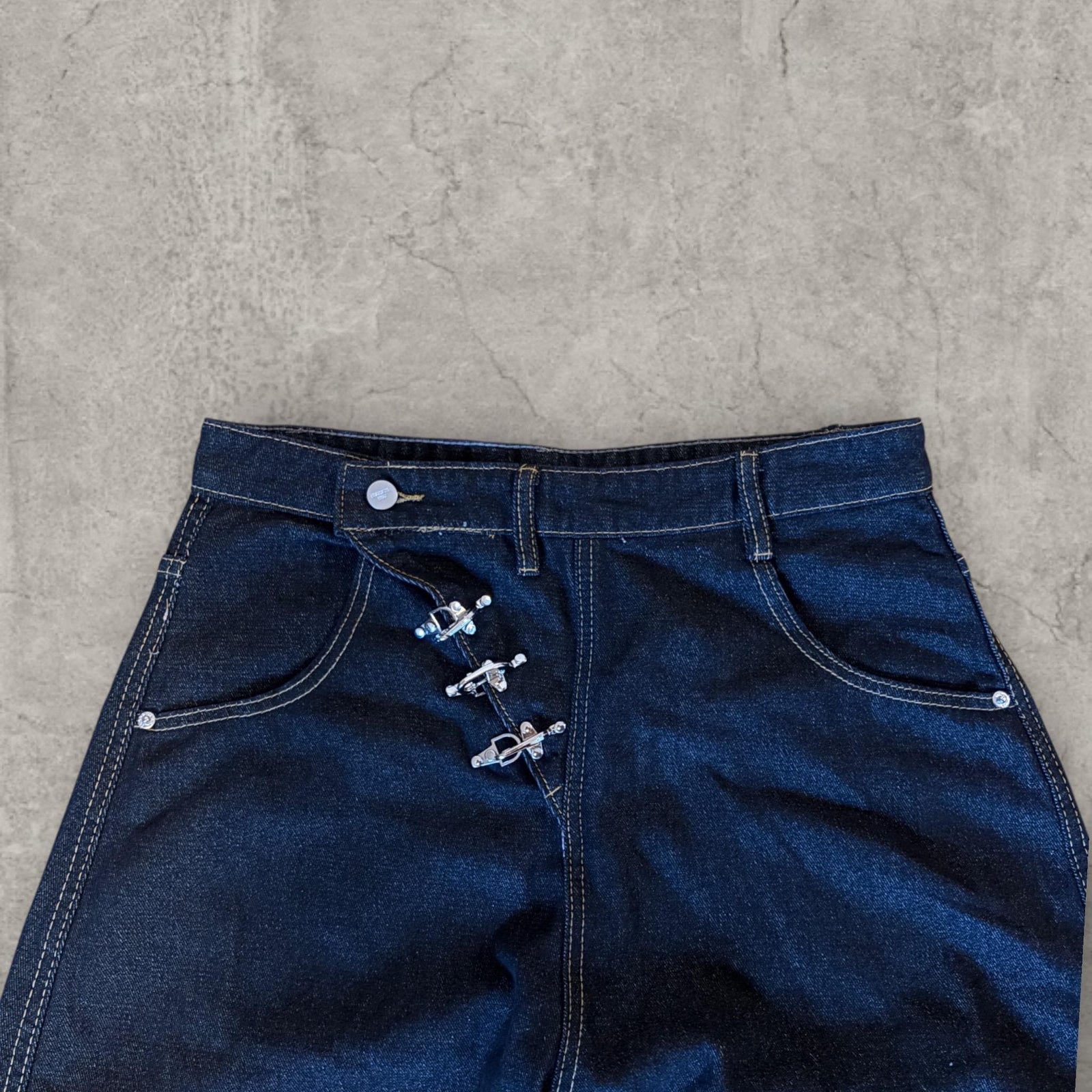 Wide leg skater jeans with silver military clasps in navy black