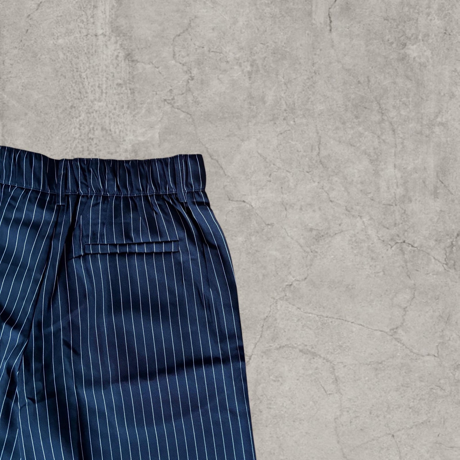 Insane baggy relaxed fit shorts in black pinstripe with pleats.