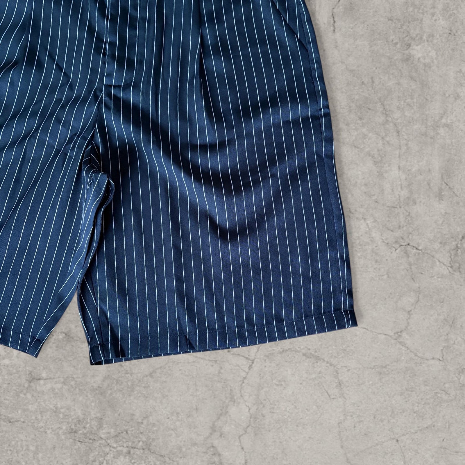Insane baggy relaxed fit shorts in black pinstripe with pleats.