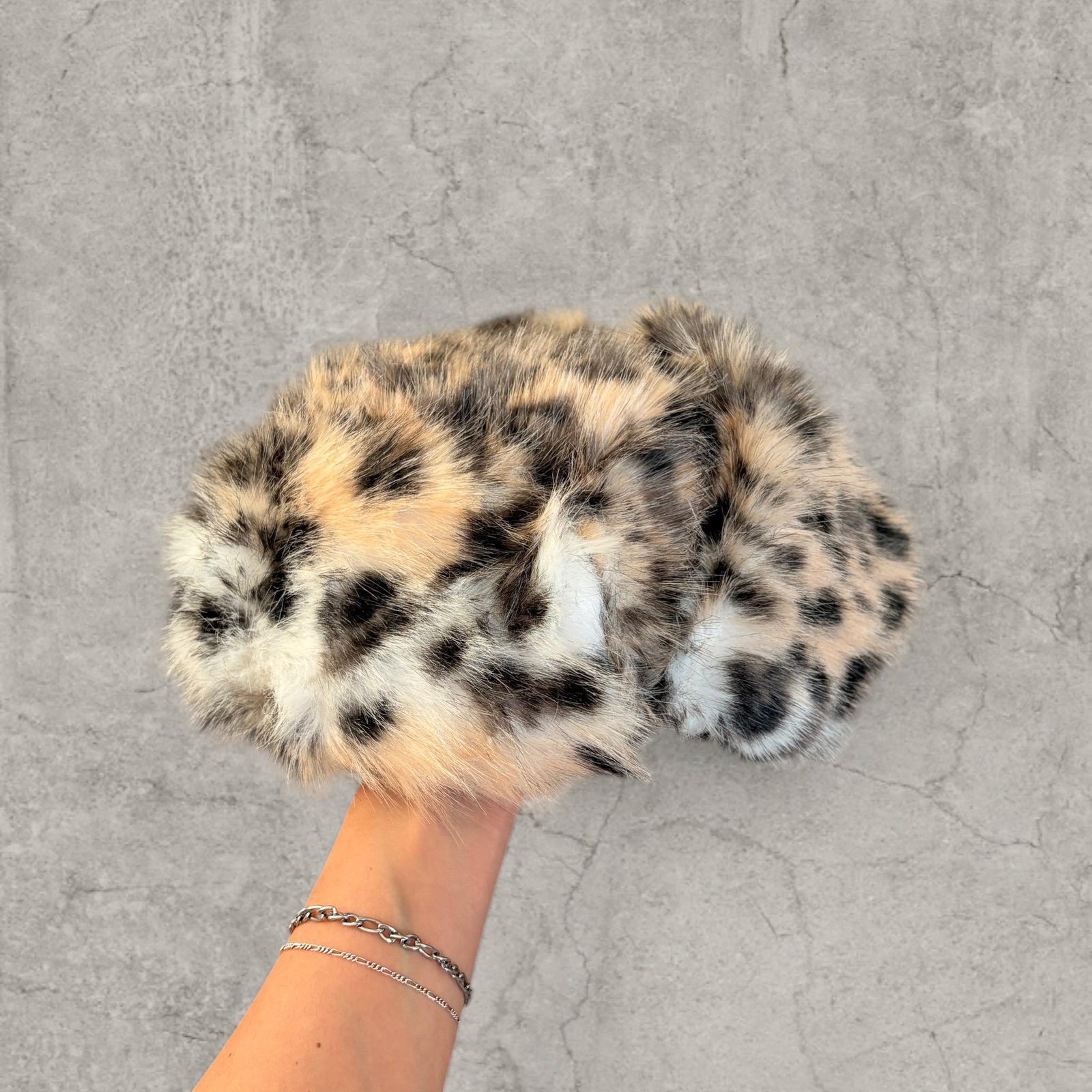 Russian Ushanka fluffy winter hat in cream beige leopard print with faux fur fluff. One size.