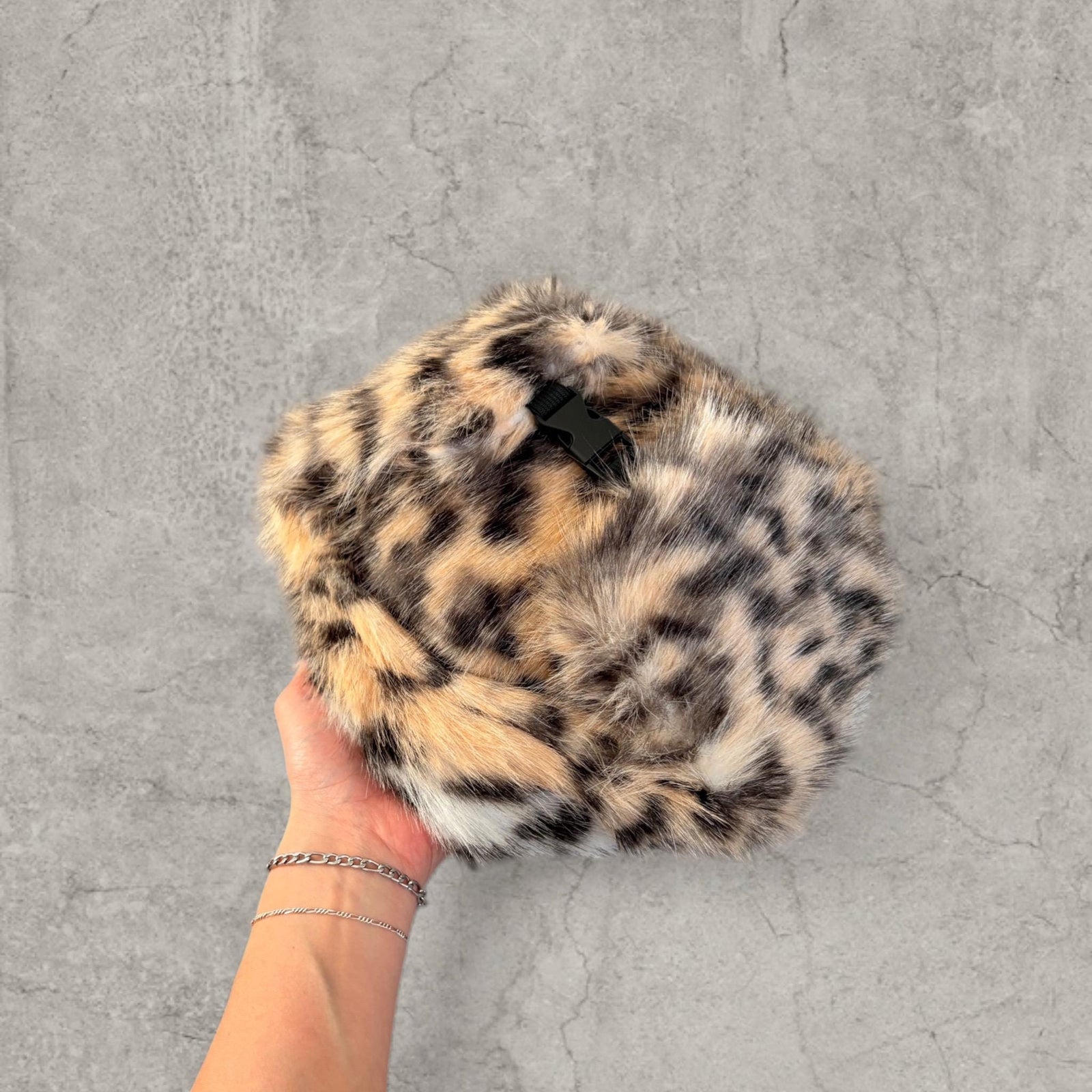Russian Ushanka fluffy winter hat in cream beige leopard print with faux fur fluff. One size.