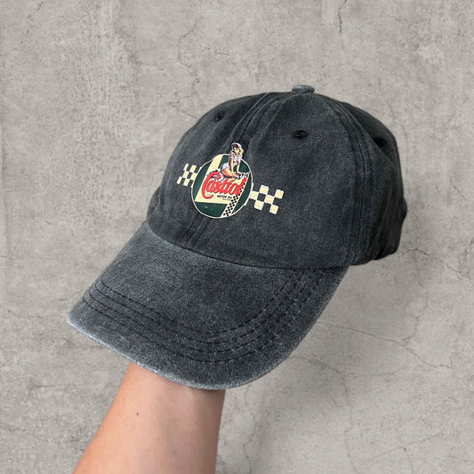 Washed black vintage style baseball cap with red white green Castrol motor oil logo on front