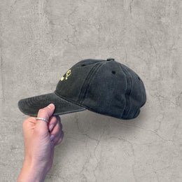 Vintage style baseball cap with yellow camel logo in black