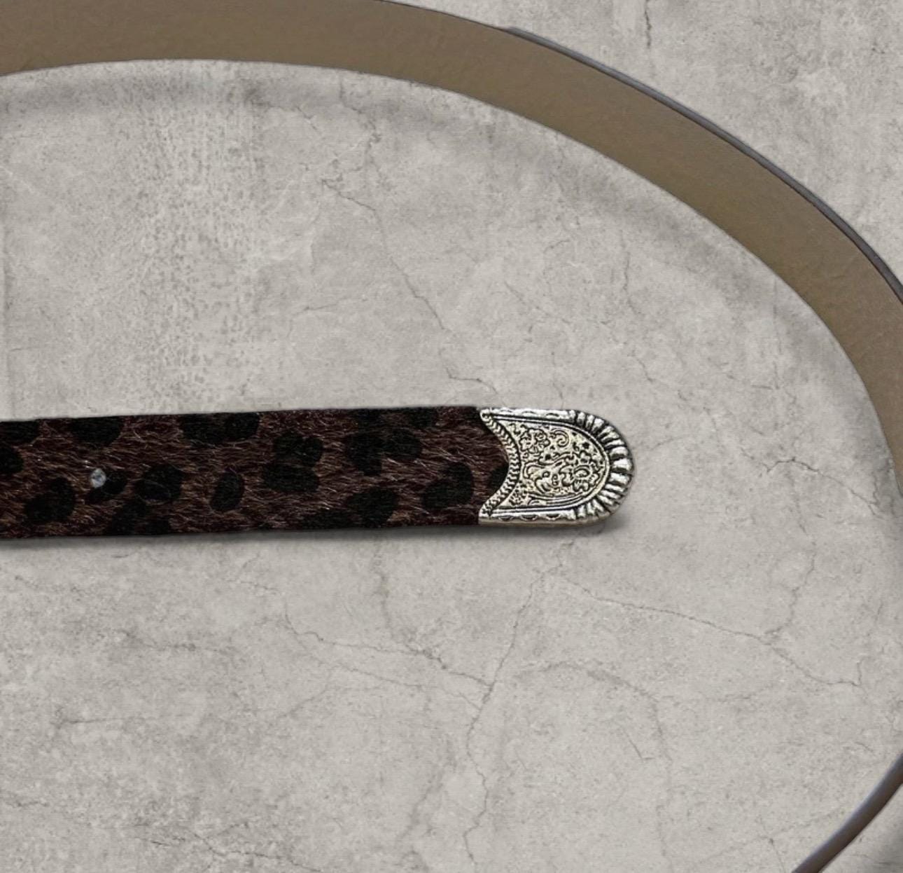 Vintage style faux leather western cowboy belt in brown leopard with silver trim. 103cm.