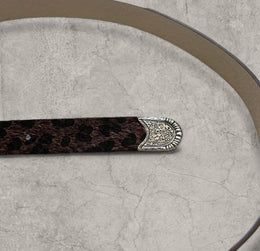 Vintage style faux leather western cowboy belt in brown leopard with silver trim. 103cm.