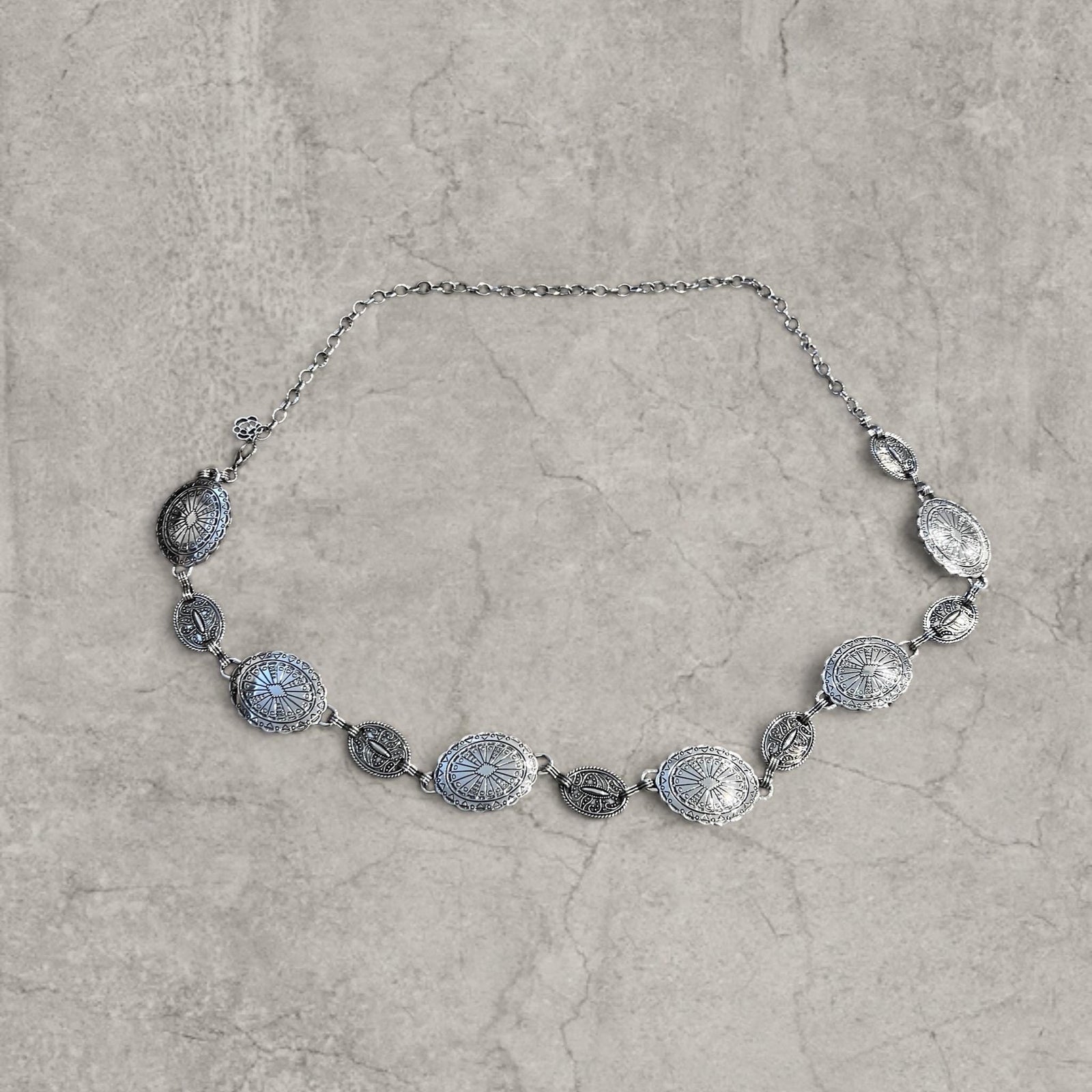 Vintage style western metal boho chain belt in silver. Adjustable