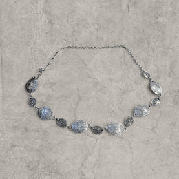 Vintage style western metal boho chain belt in silver. Adjustable