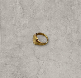 Cool vintage style gold colour stainless steel signet ring with made of magic engraving.