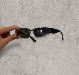 Insane alien sunglasses in black with reflective blue purple lenses. One size