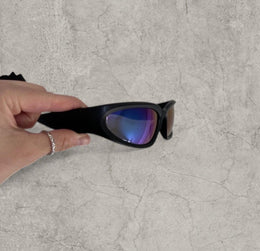 Insane alien sunglasses in black with reflective blue purple lenses. One size