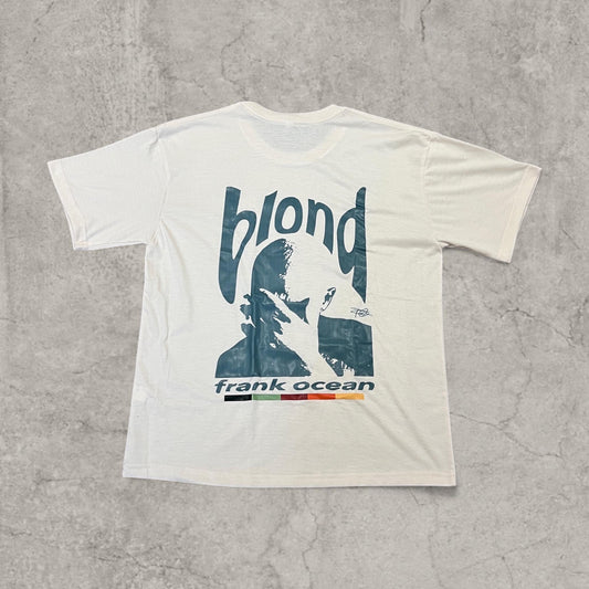 Cream Frank Ocean T-shirt laid flat showing large green graphic box print on the back with 'blond' and coloured stripes