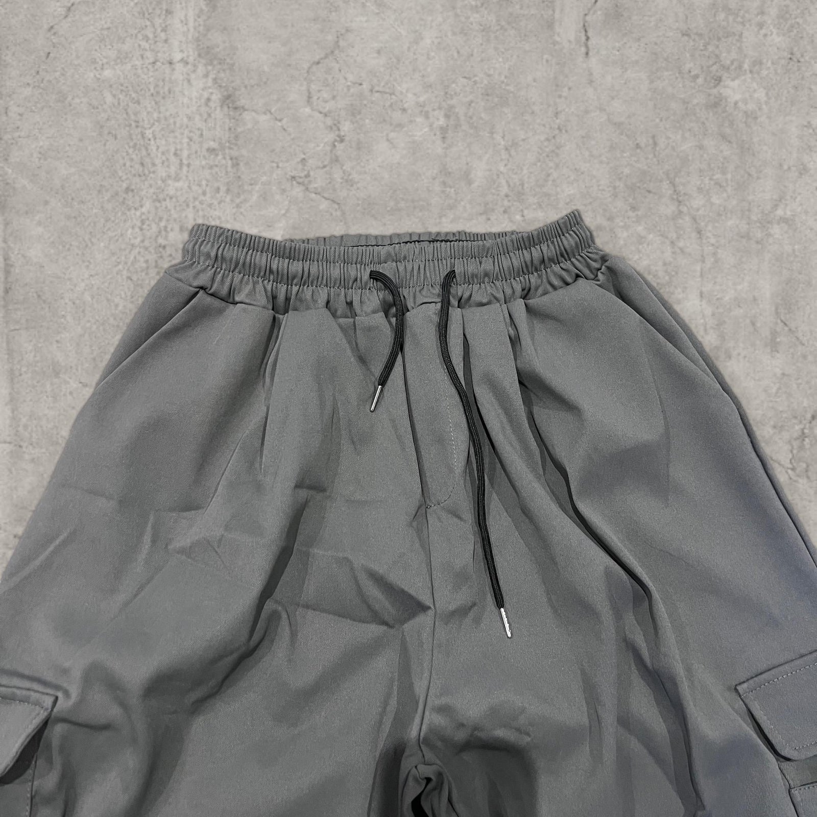 Insane baggy relaxed fit cargo trousers in grey.