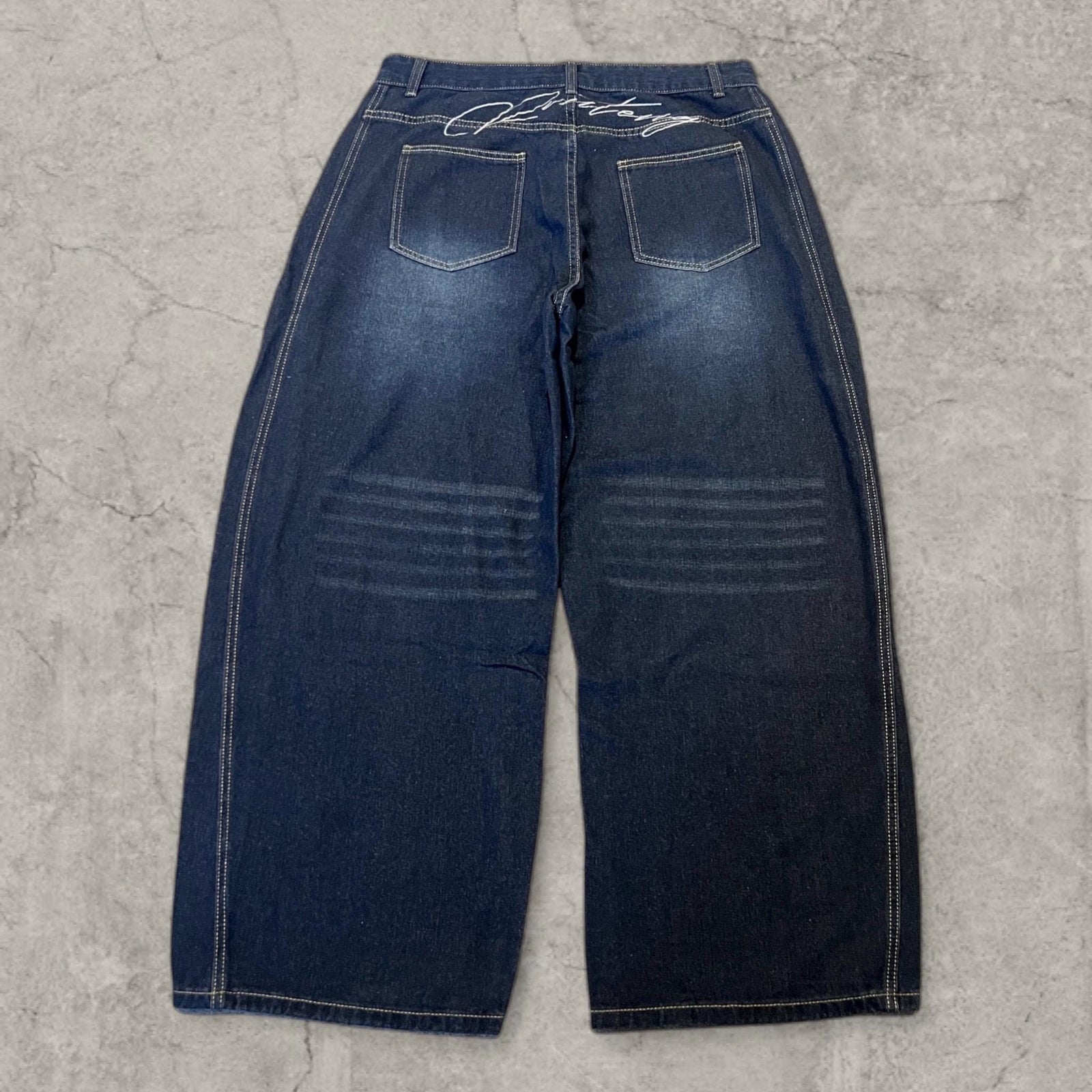 Insane baggy relaxed fit in washed navy blue with white embroidery. Multiple sizes (XS/S/M/L)