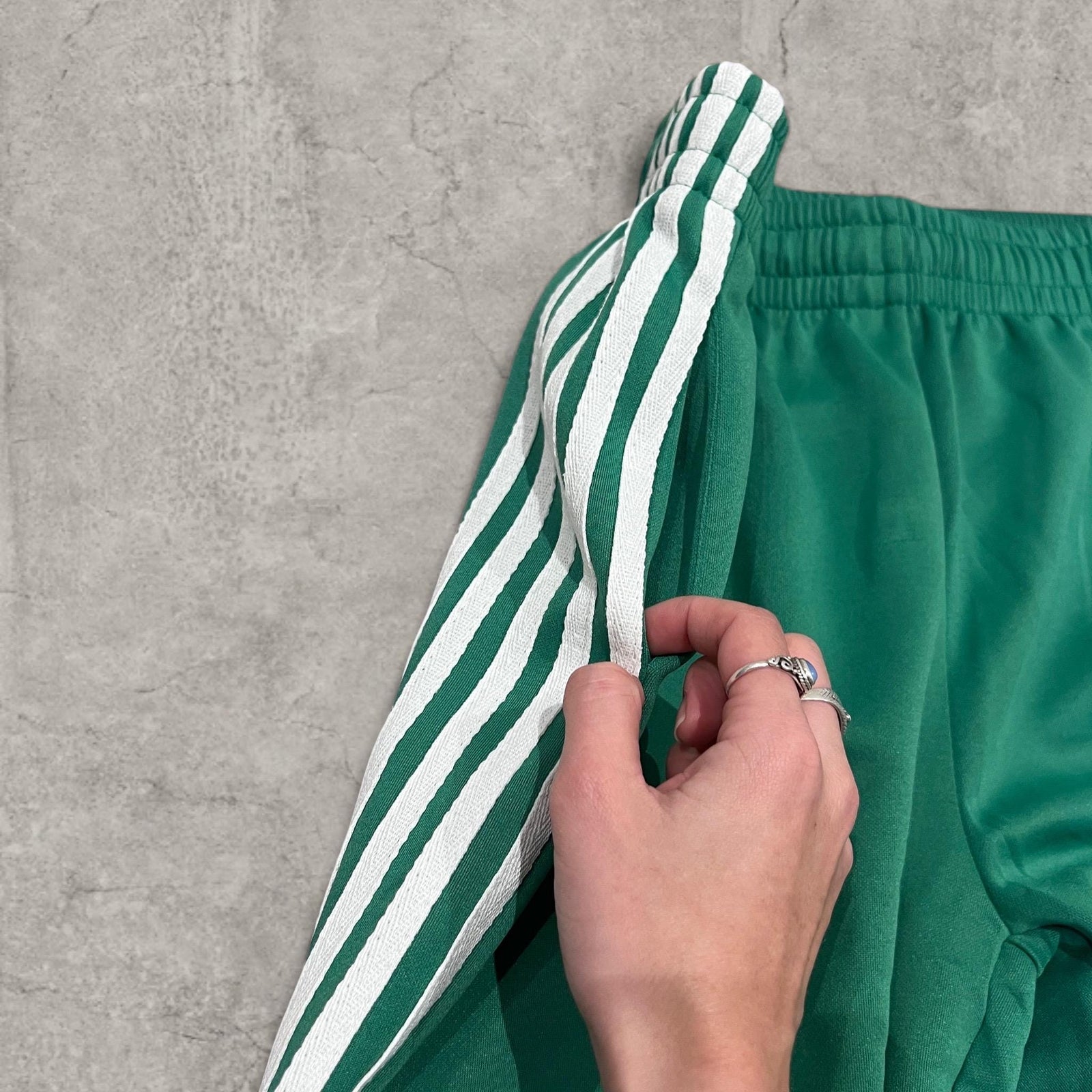 Insane baggy relaxed fit trousers in dark green with white stripes.