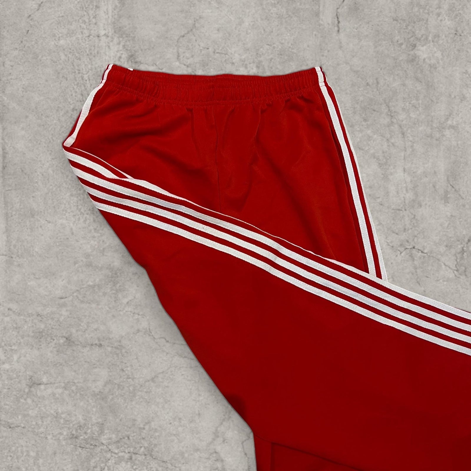 Insane baggy relaxed fit trousers in red with white stripes.