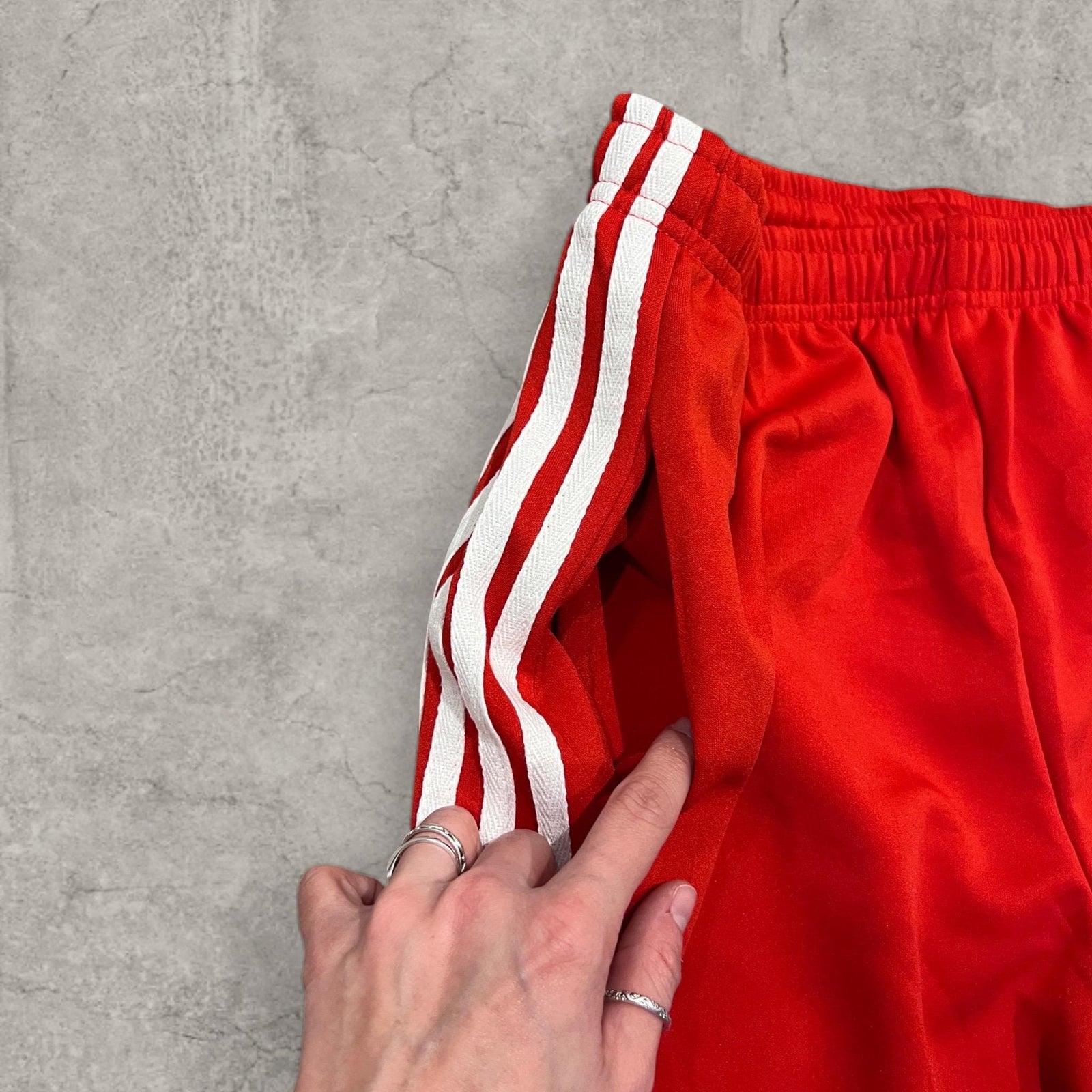 Insane baggy relaxed fit trousers in red with white stripes.