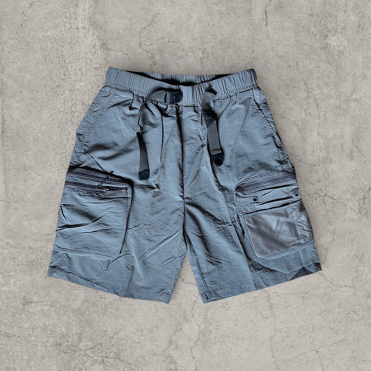 Grey baggy relaxed fit utility shorts front view showing elasticated waist with buckle and pockets