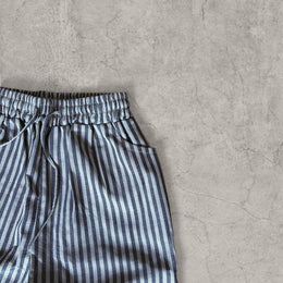 Vintage style baggy wide leg striped linen style trousers in grey/beige.