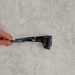 Insane sport sunglasses in black with blue purple reflective lenses. One size