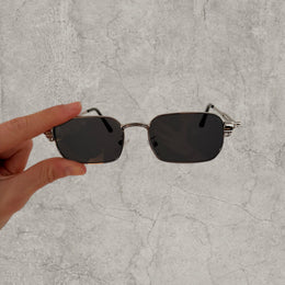 Insane UV400 sunglasses in silver grey with black lense. One size.