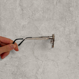 Insane UV400 sunglasses in silver grey with black lense. One size.