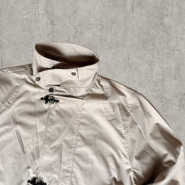 Cool vintage style  military jacket in beige/cream with silver clasps.