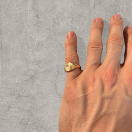 Cool vintage style gold colour stainless steel signet ring.